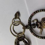 Signed SR Made In USA Costume Jewelry Bracelet With Spinning Hula Girl Charm Photo 3