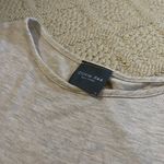 Olivia Rae Ruffly Cream T-shirt Photo 4