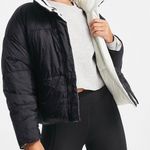 Calvin Klein Performance reversible oversized puffer coat in black/white White Size L Photo 2