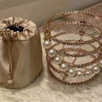 Elegant Gold Pearl Handle Bag Photo 1
