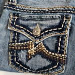 Miss Me  Irene bootcut jeans Medium wash Distressed in areas Size 28 Flap pockets Photo 11