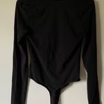 NWOT black deep v neck bodysuit Photo 1
