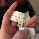 Kendall + Kylie Black and red patterned cold shoulder romper  Photo 4