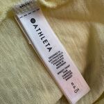 Athleta light yellow sleeveless Breezy twist bottom tank top size S Photo 7