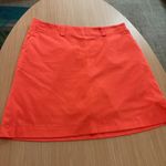 Nike  Golf Skort 14 Coral Orange Dri-Fit Polyester Blend Pockets Undershorts Photo 0