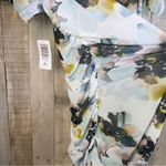 Torrid  Size 3(3X)(22-24) Stretch Mesh Lined Crewneck Floral Ruched Top Photo 3