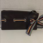 LATICO BRAND BROWN PEBBLED LEATHER WRISTLET WITH COLORFUL RIBBON
ADORABLE Photo 0