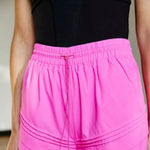 FP Movement Check It Out shorts neon barbie pink workout running pockets Photo 7