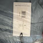 We Wore What  Windbreaker Biker Short in Dusty Blue Photo 14