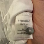 Peach Love  Sheer Sleeve Tie Front Star Embroidered Ruffle Hem Romper Photo 6