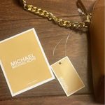 Michael Kors Jet Set Travel Medium Dome Crossbody Bag Purse Luggage Brown NWT Photo 3