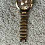 Anne Klein women’s vintage gold tone bracelet wristwatch OS measurements shown Photo 3