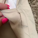 Under Armour  loose fit woman golf style shorts size 6 khaki color Photo 2