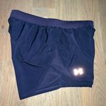 Under Armour Women’s  Navy Blue Lined Running Shorts Sz small Photo 1