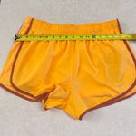 Nike Women's Orange Dri-Fit Tempo Running Shorts - Size Large Photo 6