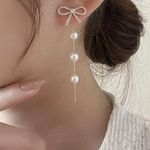 Hollow Bow Shiny Zircon Dangle Earrings White Photo 2