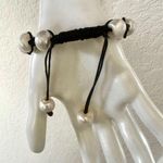 Pearl bracelet on adjustable black silk cord Photo 5