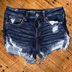 American Eagle  distressed dark wash cutoff jean shorts Photo 0