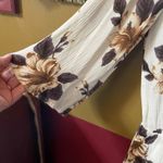 O'Neill  size S jumpsuit  (shorts) crepe floral lace up front key hole back. Photo 2