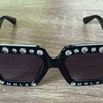 Sleek Black Sunglasses Photo 5