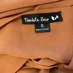 Double Zero | Light caramel V-neck long split sleeve blouse.  Longer, sheer back. Photo 8