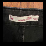 SO  ultimate highrise Jegging black rugged - size 7/28 gently warn and excellent condition for rugged jeans. Holes in kneecap areas only and no manicure at ankles leaving rugged affects. Measurements approximately 13” waste x 12” rise x 38” long. Non smoking home. priced to sell at as is condition. Don’t like my price, make reasonable offer! And thank you for checking my closet. Photo 4