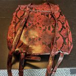 ZARA COPY -  basic collection snakeskin red/black backpack type purse in EUC. Photo 1