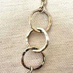 Long silver tone necklace with circles Photo 4