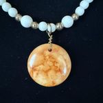 Women's off white and gold pendant necklace with adjustable lobster claw clasp Photo 2