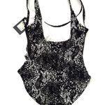 DKNY Mesh Side Inserts RuchedWaist One Piece
Swimsuit Size 4 Photo 4