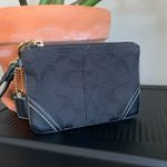 Coach signature canvas wristlet with contrast stitching EUC brass hardware Photo 0