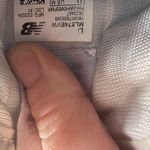 New Balance Cream and White Athletic Shoes Photo 3