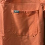 FIGS  Women’s Catarina One Pocket Scrub Top in color Hot Coral Size XS Photo 2