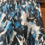 Nike Women's Leg-A-See - Mishmash AOP Light Blue Lacquer/Black Pants Photo 1