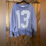 Free People  WE THE FREE GRAPHIC CAMDEN PULLOVER SWEATSHIRT Photo 1