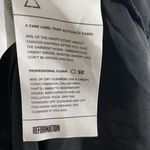 Reformation  Silky Black Button-Up Blouse with White Trim Photo 12