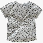 Brandy Melville  White with Black Flowers Short Sleeve Top Photo 1