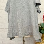 Woman Within Grey Tee Photo 3