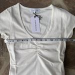 We Wore What  Women's Cream White V-Neck Ruched Top cotton spandex fitted ivory Photo 2