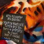 Win Win Bell Sleeve Tunic‎ Photo 4