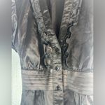 A Byer Buyer of CA Byline M Satin Ruffled Cap Sleeve Tie Back Blouse in Black Photo 5