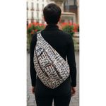 KAVU  Sling Bag Backpack w/Adjustable Rope Strap Diamond Print Multiple Pockets Photo 1