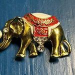 Vintage elephant pin brooch gold tone red white enamel rhinestones trunk up Photo 0