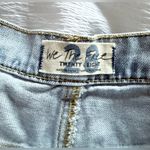 Free People  Harlie Denim Shortie in Mirage Fray Blue Flared Denim Shorts Size 28 Photo 6
