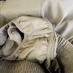 Nike  One Dri-FIT Ultra High-Waisted 3-inch brief-lined shorts in an olive green Photo 4