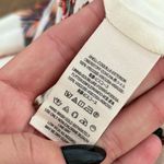 Free People hot tropics front tie floral cropped jumpsuit Photo 5