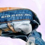 American Eagle Outfitters super super stretch x super hi-rise jegging in dark wash blue size 4. Photo 2