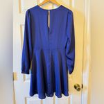 EXPRESS •  • NWOT Women’s long sleeved Blue Wrap Dress Photo 1