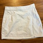 LIONESS Boutique White Mini Denim Skirt with Slit Photo 0