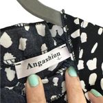 None Women’s Casual Floral Print Cap Sleeve Ruffle Neck Loose Babydoll Shirt Photo 6